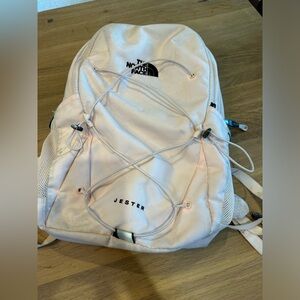 Pink north face jester backpack